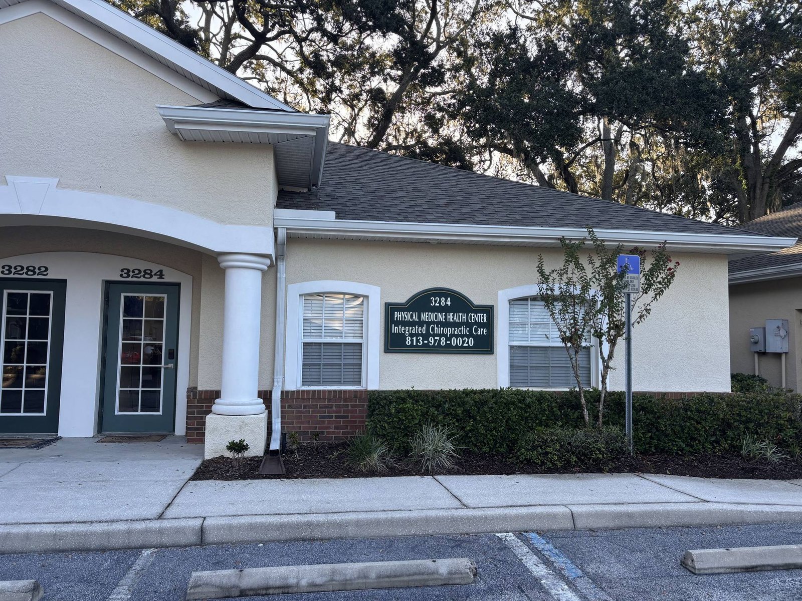 Physical Medicine Health Center clinic entrance at 3284 Cove Bend Drive, Tampa, FL